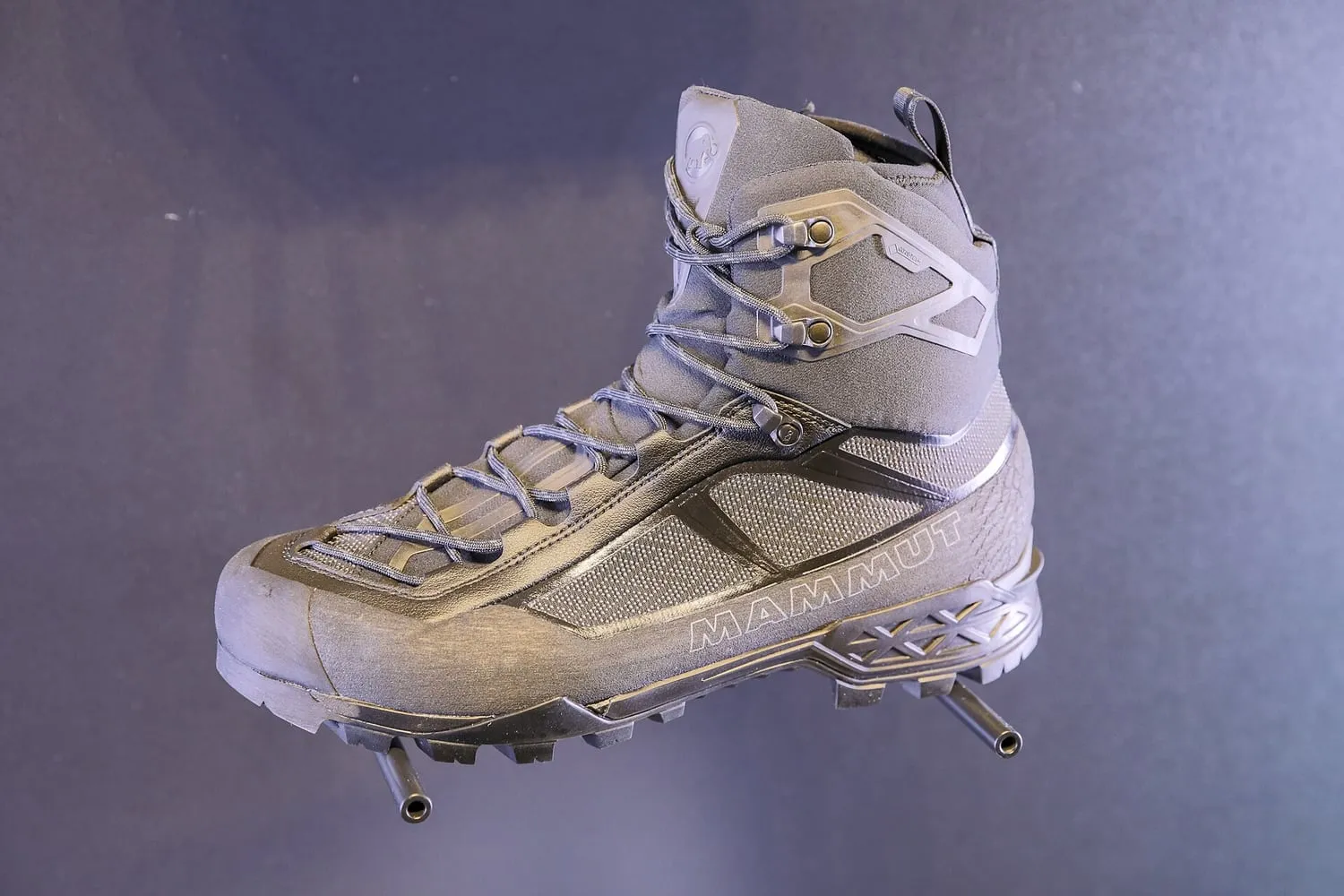 A fabric hiking boot photographed against a plain background