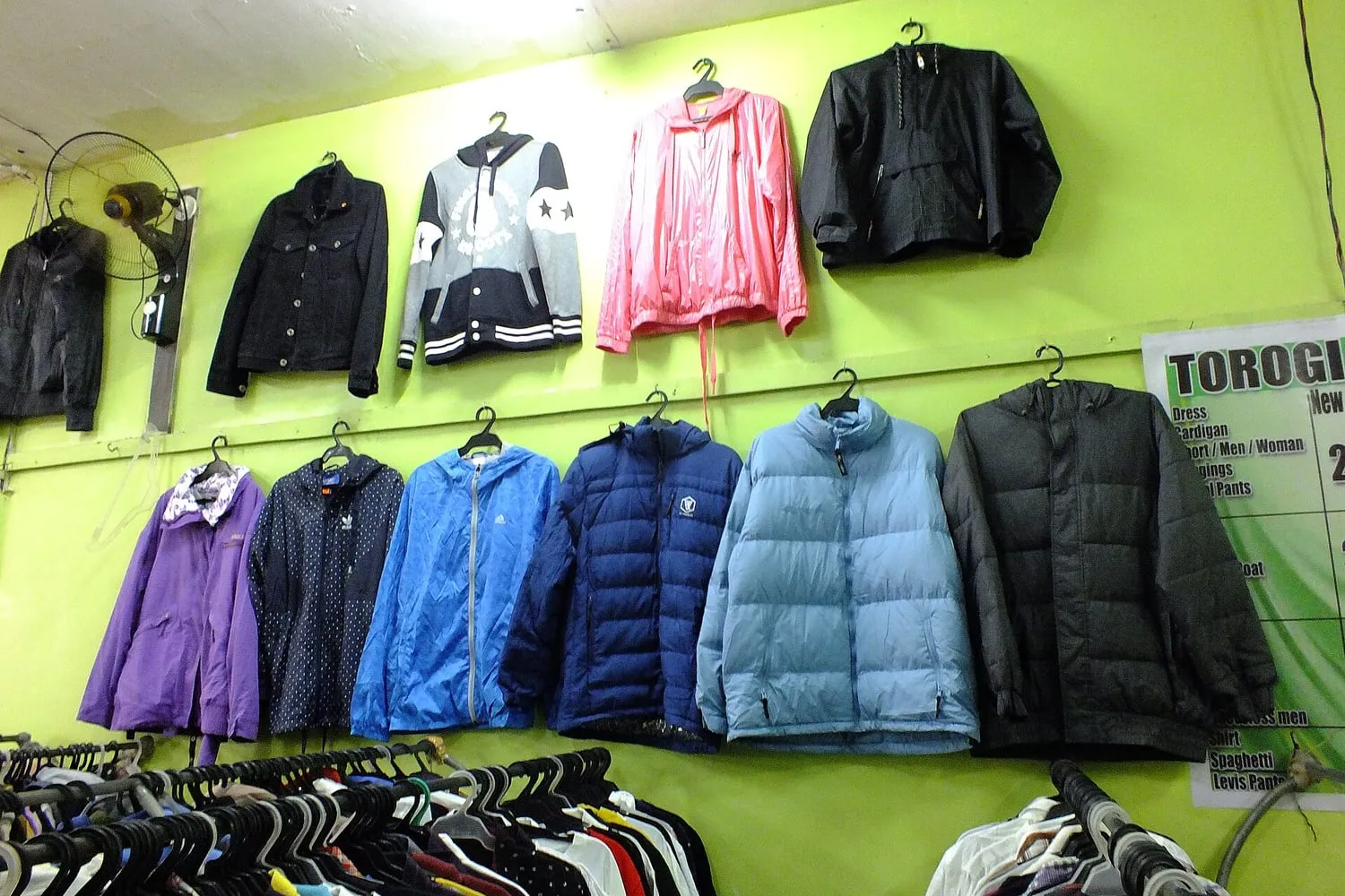 Insulated jackets hanging on a rail