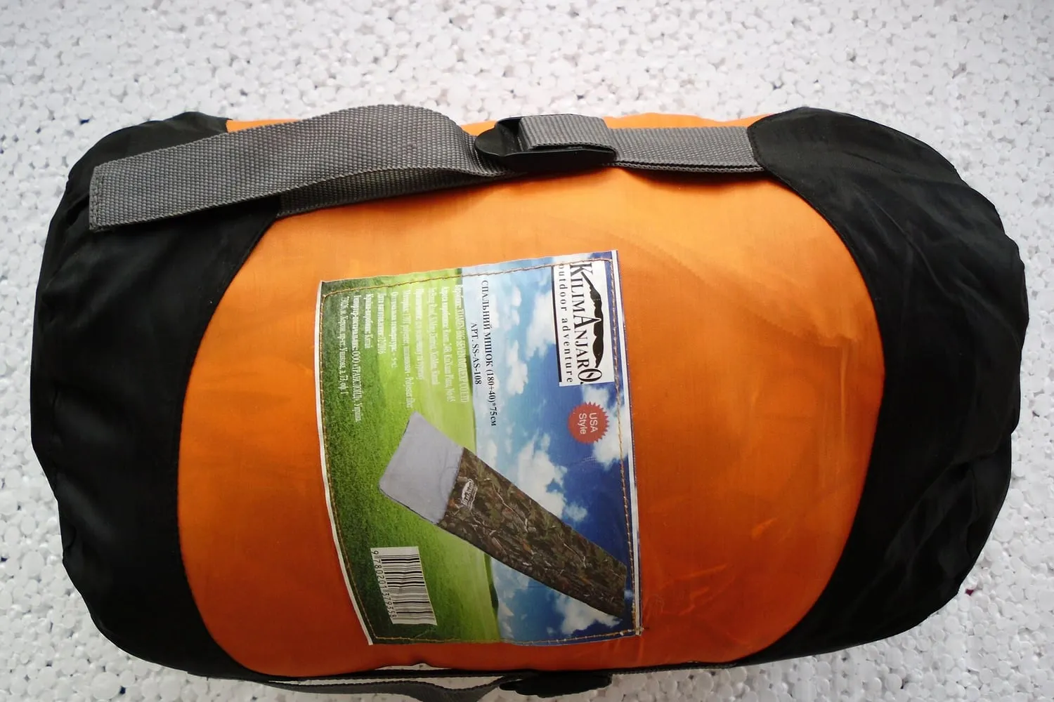 A sleeping bag with its hood and baffles visible