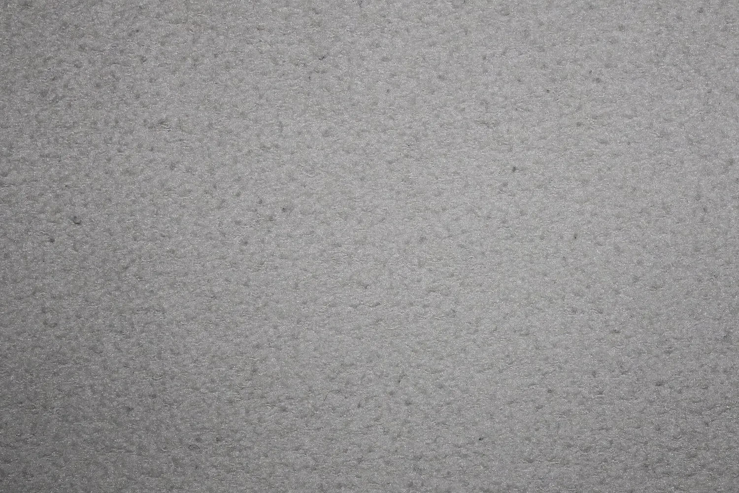 A close view of the fine texture of a technical shell fabric